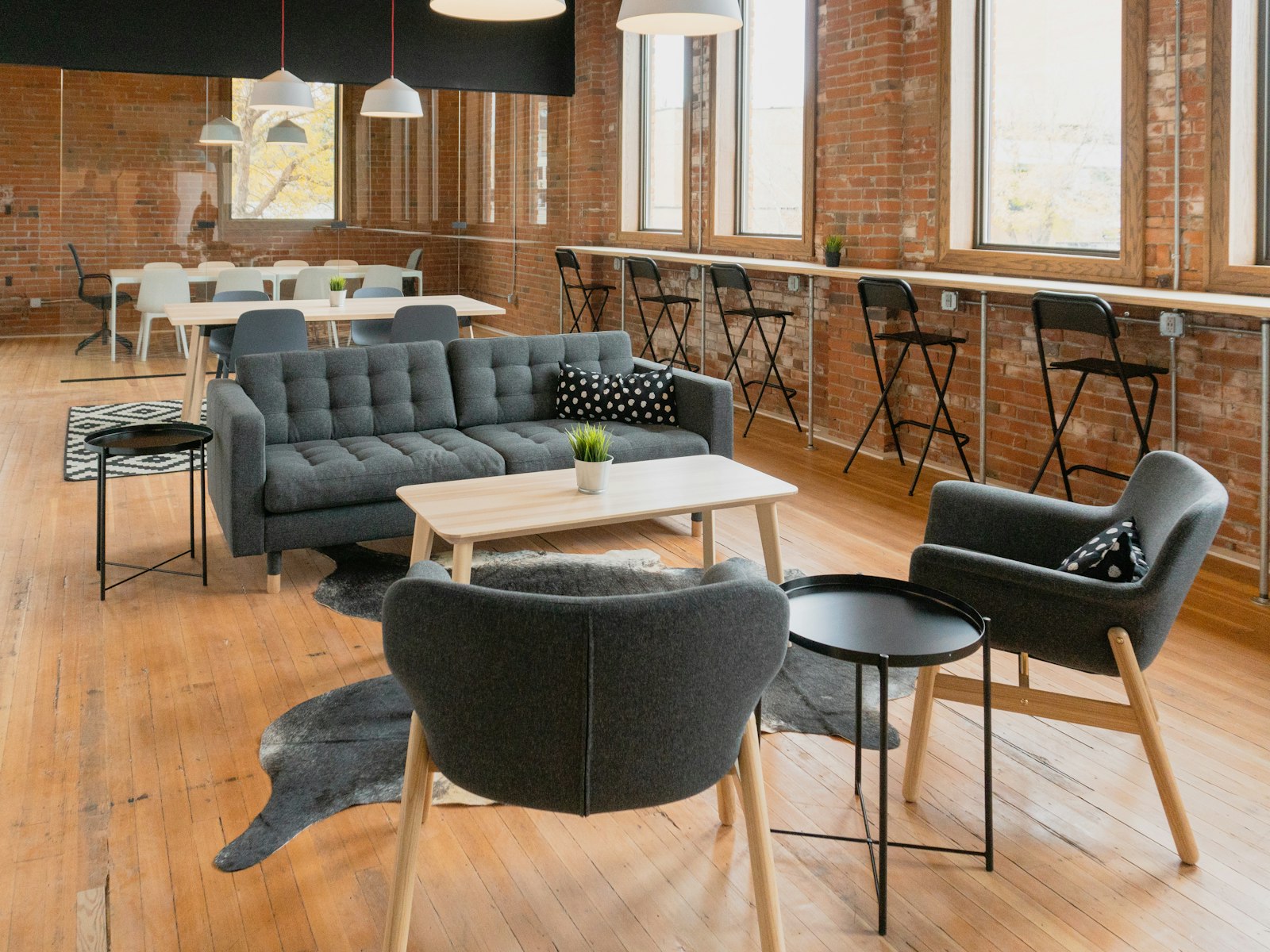 A considered contemporary workspace with warm timber and stone